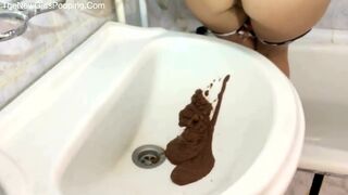 Girl shitting diarrhea into a basin, ScatKings.com Scat Porn 1 ScatKings.com Scat Porn